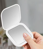 Mirror with portable charger